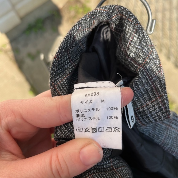 Pleated Mini Skirt With Sailor Style Buttons Down Front - Picture 5 of 6